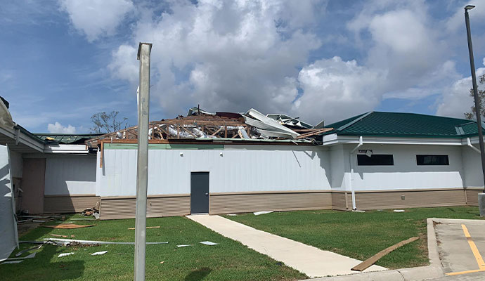 Building with a torn roof