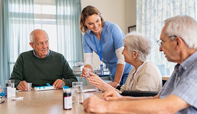 Care giver taking care of elderly citizens