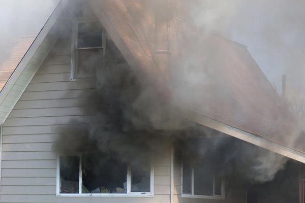 Fired house spreading smoke outside