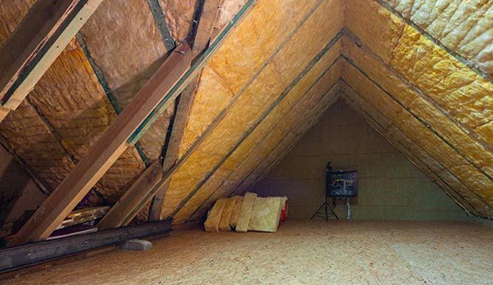 New insulation installed to restore energy efficiency after fire damage.