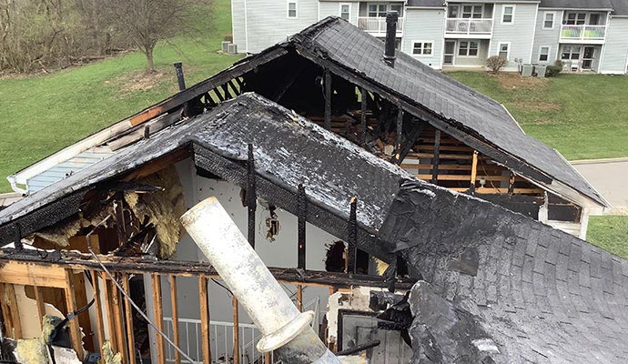 Fire damaged residential house roof