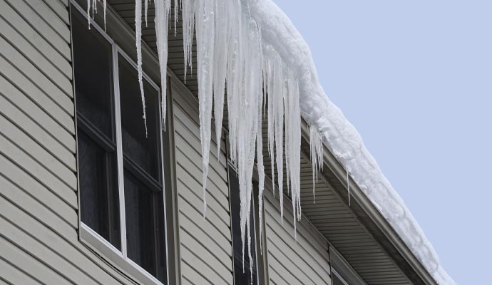 Snow covered house roof