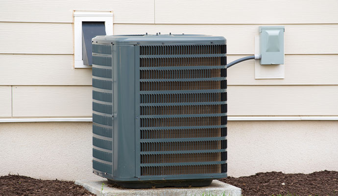 Outdoor AC unit next to a house