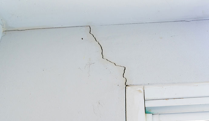 Preventing structural water damage wall cracks