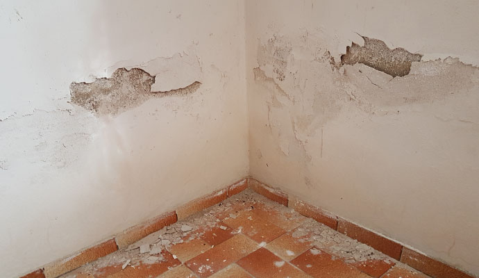 Structurally damaged wall