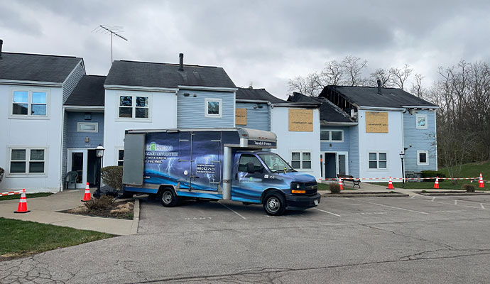 A Teasdale Fenton restoration truck at a fire-damaged apartment.