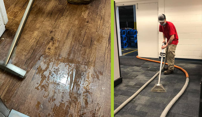 Professional worker cleaning water damaged floor in Goshen